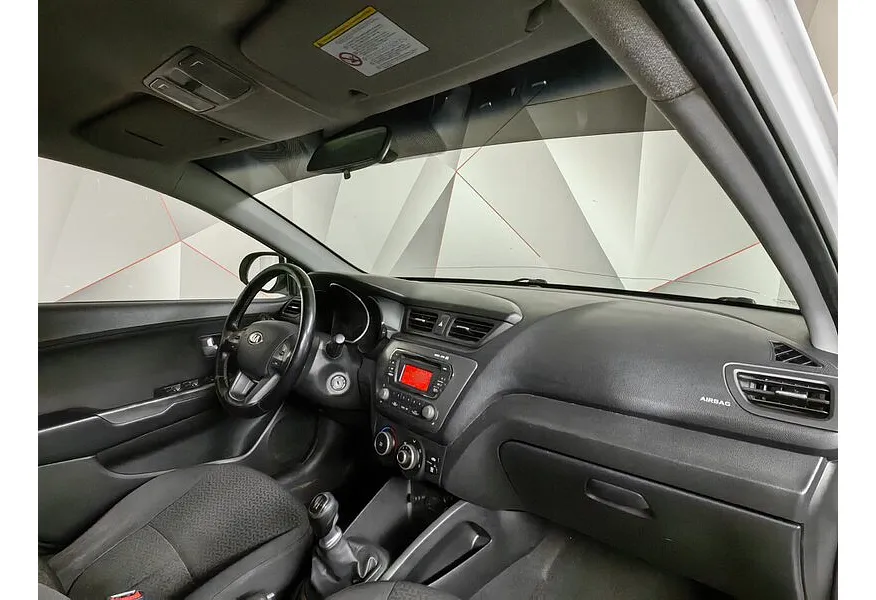 Kia Rio 1.6 MT (123 л.с.) Белый в АВИЛОН. Слайд №11