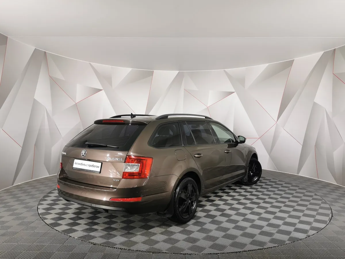 Skoda Octavia 1.8 TSI DSG 4x4 (180 л.с.) Elegance Коричневый в АВИЛОН. Слайд №2