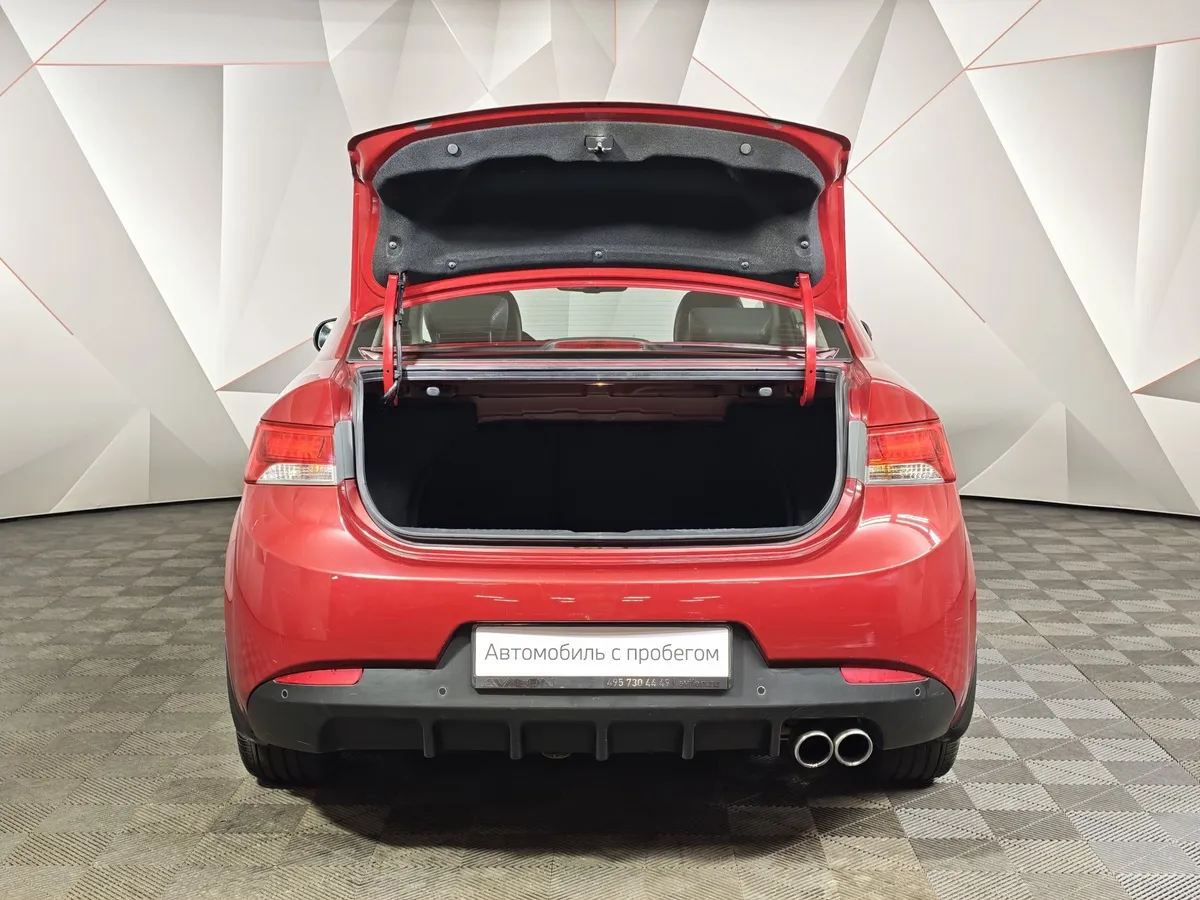 Kia Cerato 2.0 AT (150 л.с.) Luxe Красный в АВИЛОН. Слайд №11