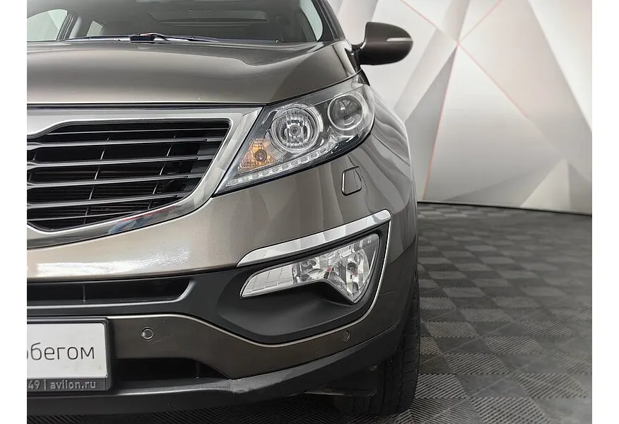 Kia Sportage 2.0 AT 4WD (150 л.с.) Luxe Коричневый в АВИЛОН. Слайд №10