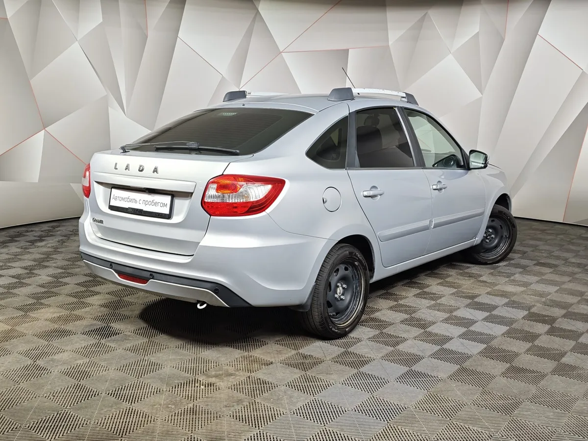 ВАЗ (Lada) Granta 1.6 MT 8кл (87 л.с.) Серый в АВИЛОН. Слайд №2