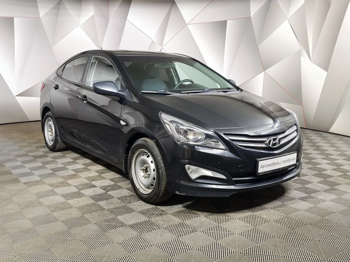 Hyundai Solaris 1.4 MT (107 л.с.) Comfort Черный в АВИЛОН. Слайд №3