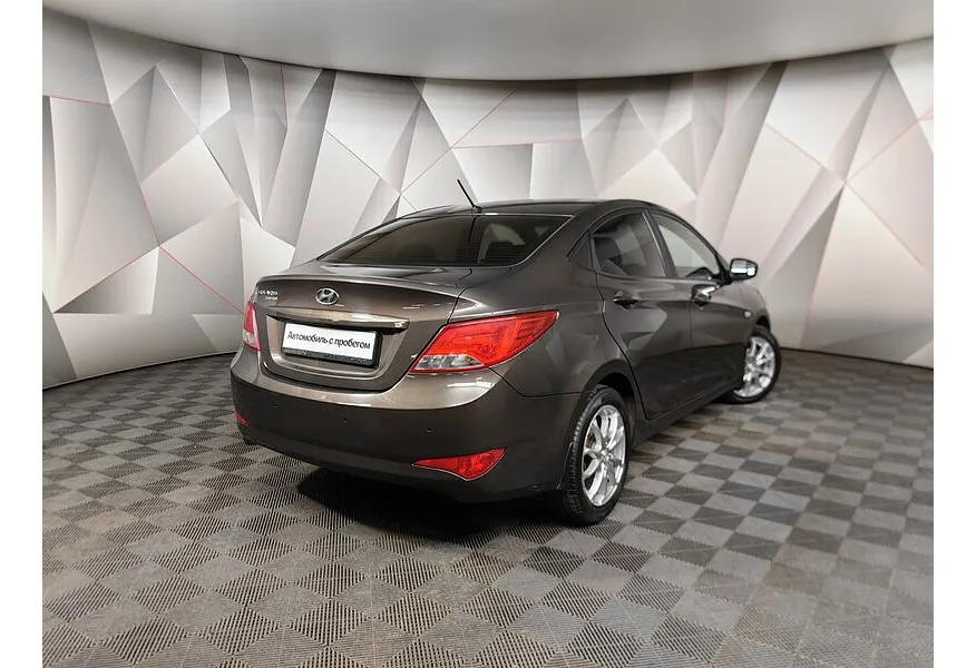 Hyundai Solaris 1.6 AT (123 л.с.) Super Series 1 Коричневый в АВИЛОН. Слайд №2