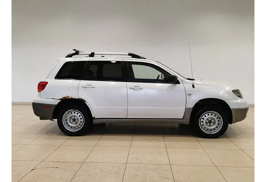 Mitsubishi Outlander 2.4 AT 4WD (160 л.с.) Белый в АВИЛОН. Слайд №6