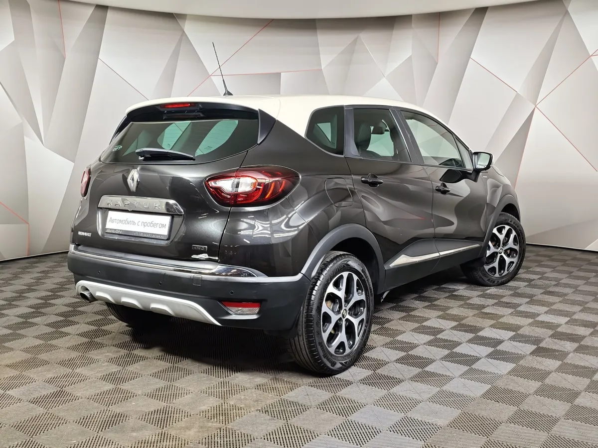 Renault Kaptur 2.0 AT AWD (143 л.с.) Белый в АВИЛОН. Слайд №2