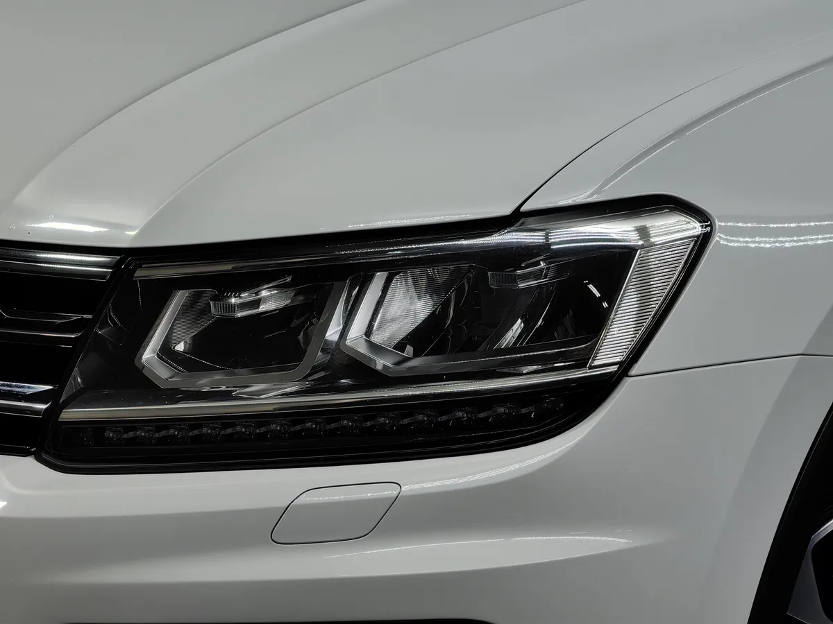 Volkswagen Tiguan 1.4 TSI BlueMotion DSG (150 л.с.) Белый в АВИЛОН. Слайд №10