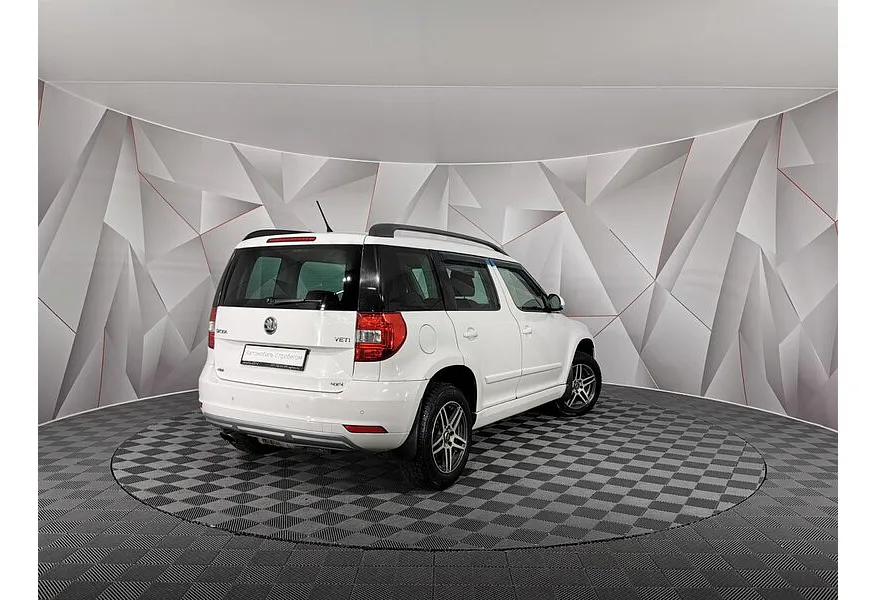 Skoda Yeti 1.8 TSI 4x4 DSG (152 л.с.) Белый в АВИЛОН. Слайд №2