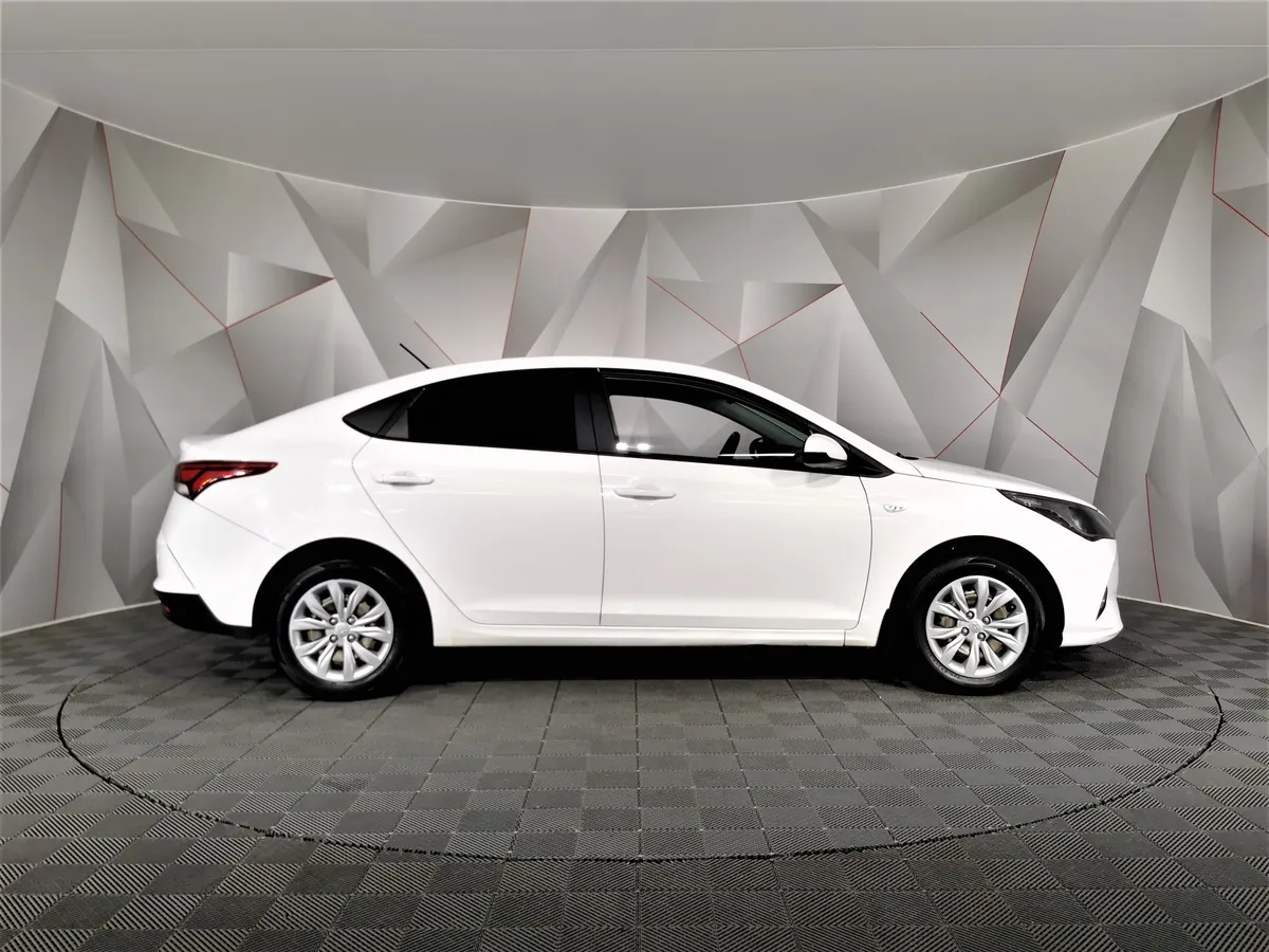 Hyundai Solaris 1.6 MT (123 л.с.) Comfort Белый в АВИЛОН. Слайд №6