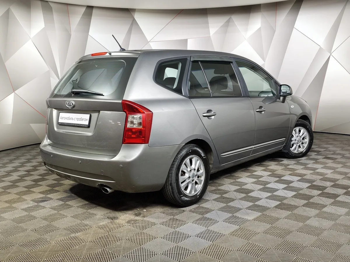 Kia Carens 2.0 AT (145 л.с.) Серый в АВИЛОН. Слайд №2