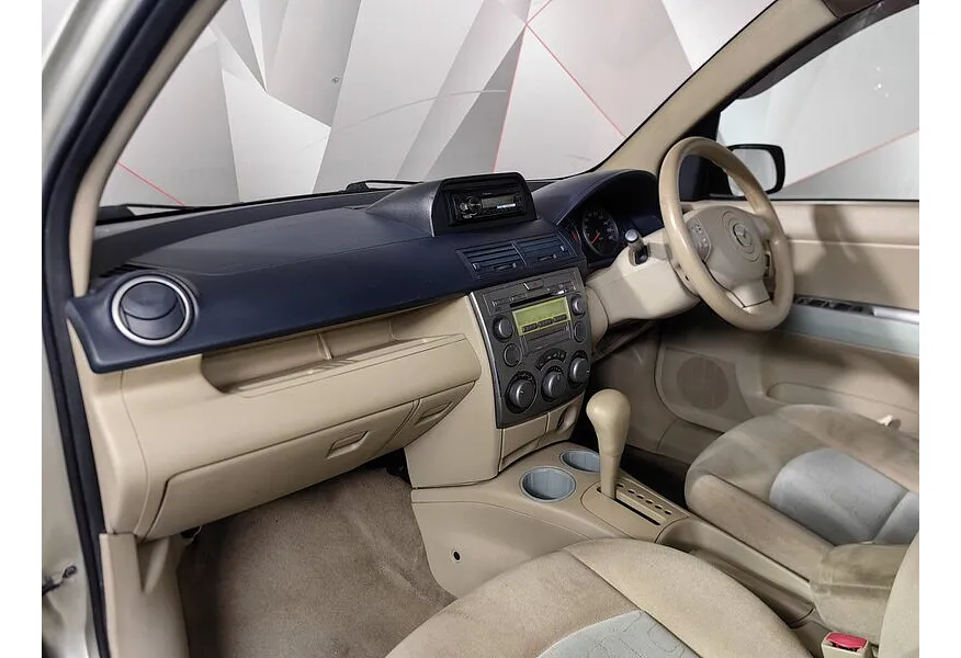 Mazda Demio 1.5 AT (113 л.с.) Серый в АВИЛОН. Слайд №17