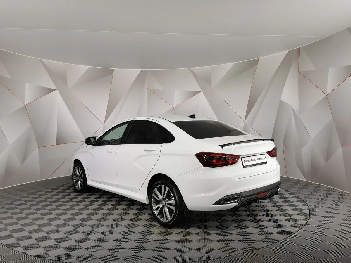 ВАЗ (Lada) Vesta 1.8 CVT (122 л.с.) Enjoy'24 Белый в АВИЛОН. Слайд №4