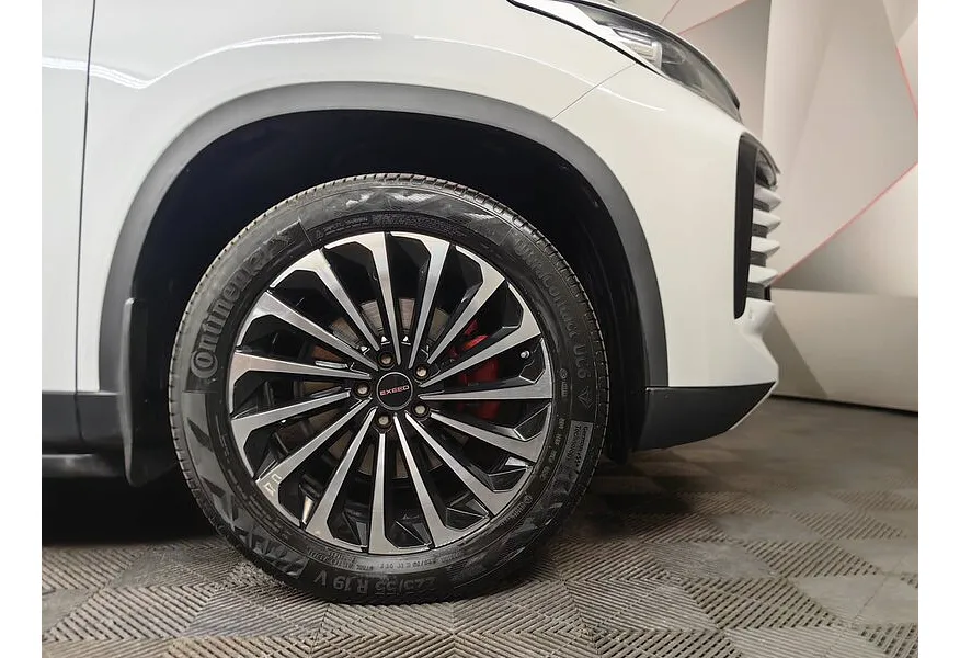 EXEED TXL 2.0 DCT7 AWD (197 л.с.) Sport Edition Белый в АВИЛОН. Слайд №9