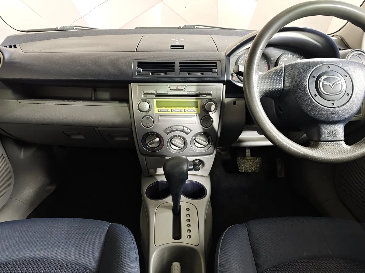Mazda Demio 1.5 AT (100 л.с.) Белый в АВИЛОН. Слайд №13