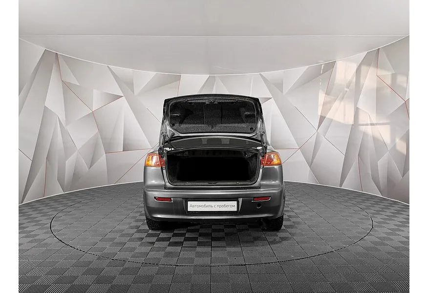 Mitsubishi Lancer 1.8 MT (143 л.с.) Серый в АВИЛОН. Слайд №11