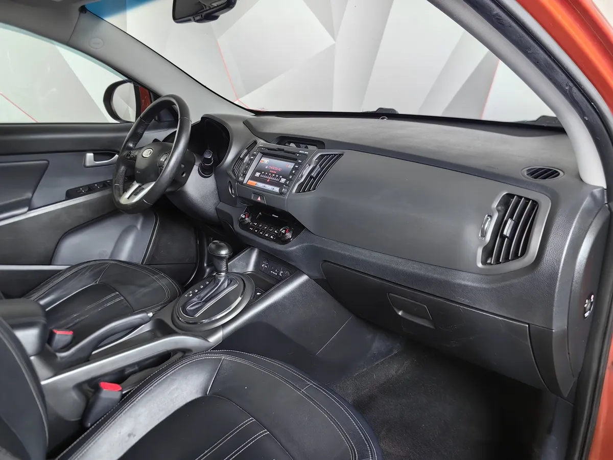 Kia Sportage 2.0 AT AWD (150 л.с.) Оранжевый в АВИЛОН. Слайд №12