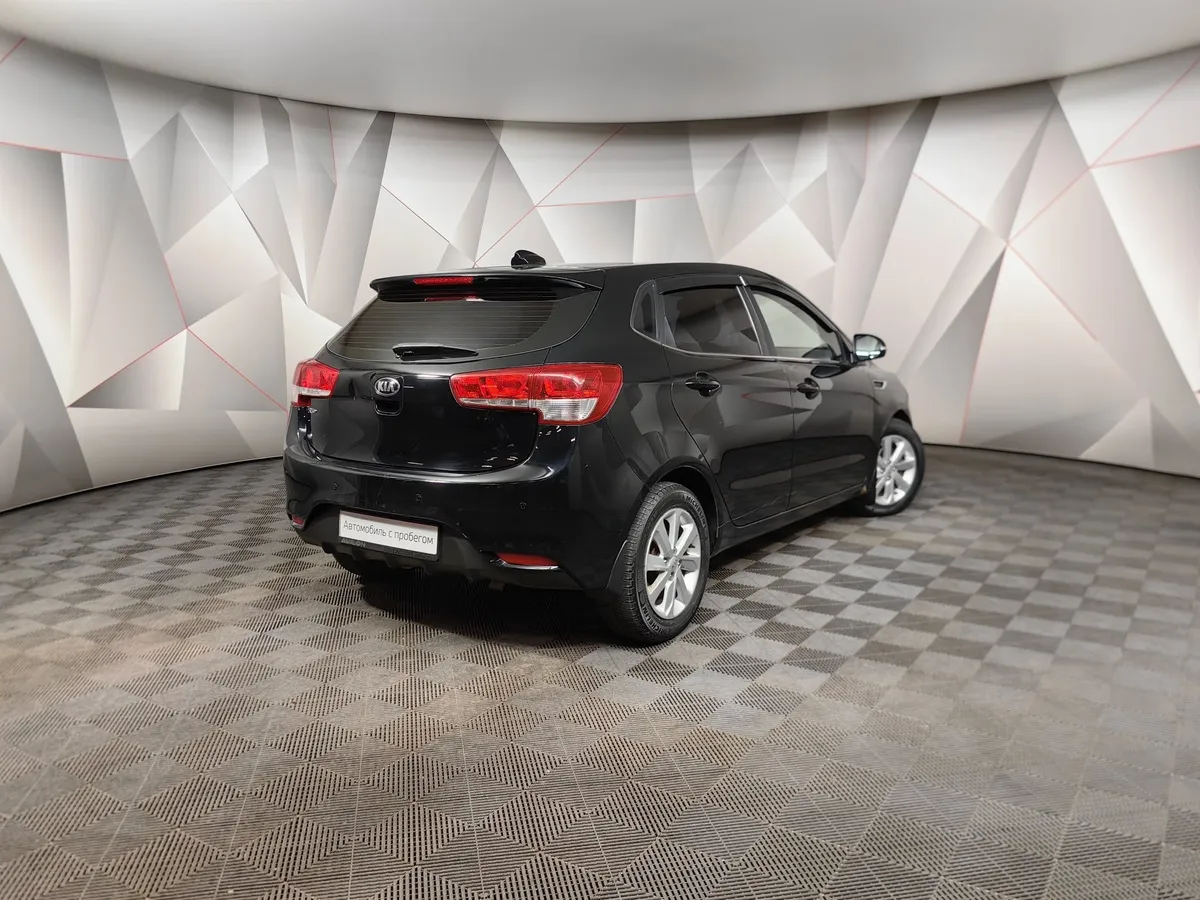 Kia Rio 1.6 AT (123 л.с.) Черный в АВИЛОН. Слайд №2