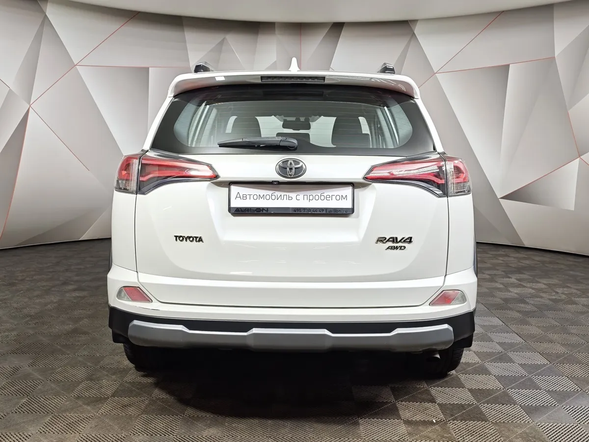 Toyota RAV4 2.5 AT 4WD (180 л.с.) Престиж Белый в АВИЛОН. Слайд №8