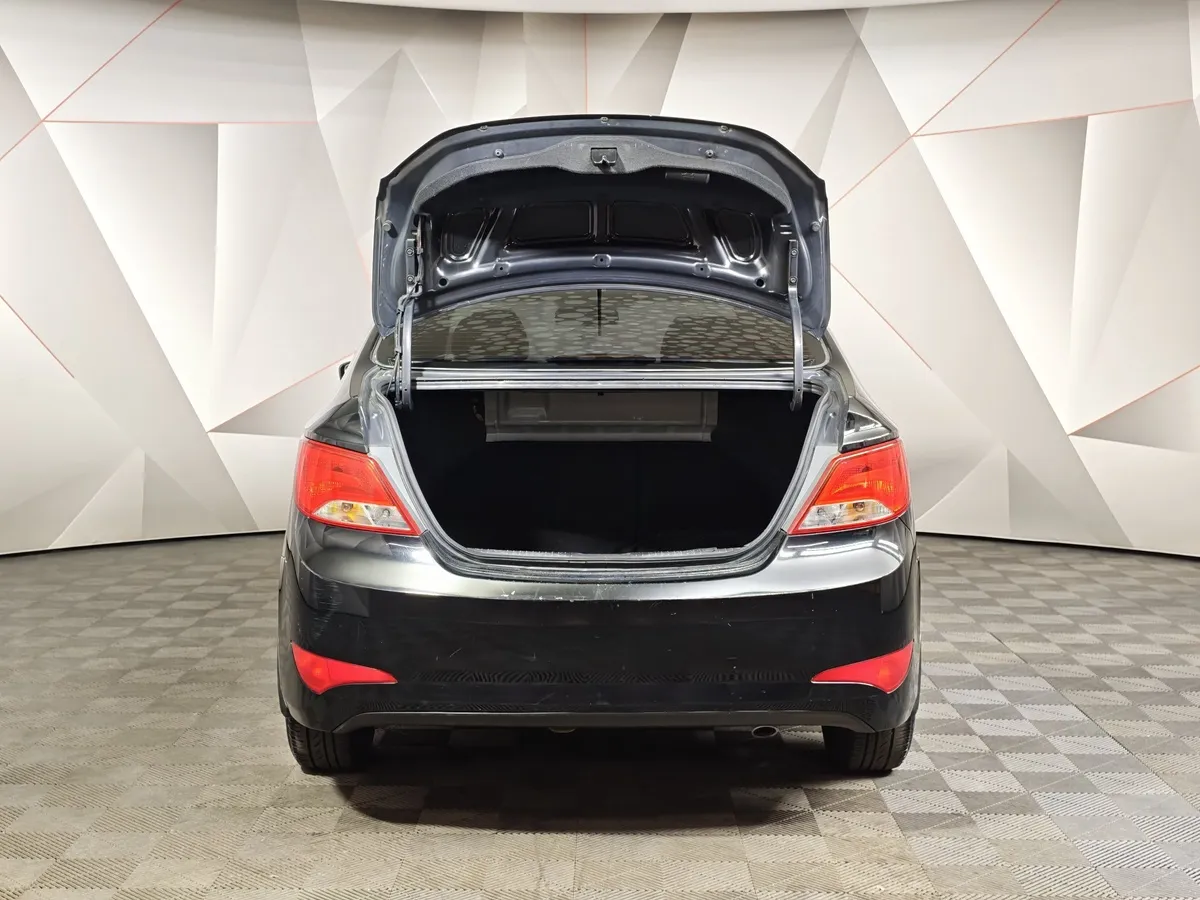 Hyundai Solaris 1.4 MT (107 л.с.) Comfort Черный в АВИЛОН. Слайд №12