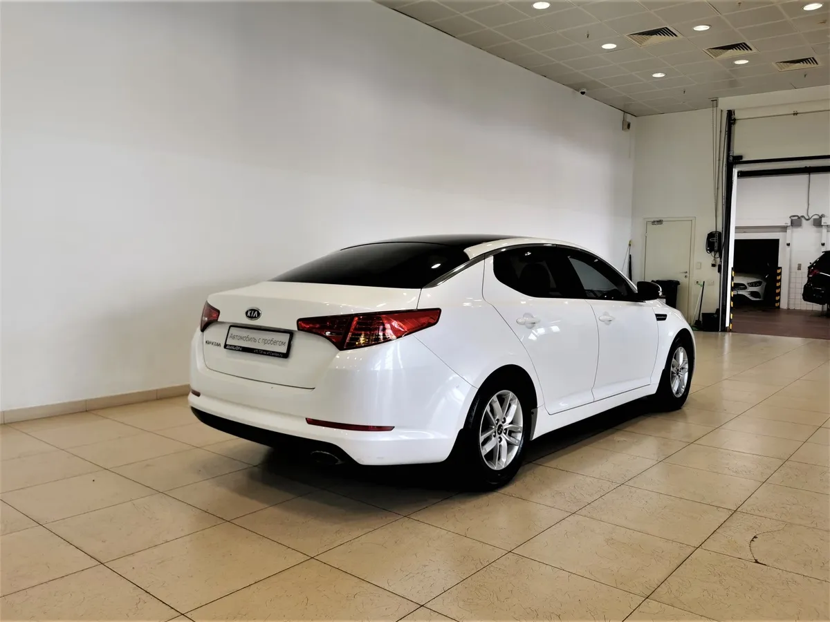 Kia Optima 2.0 AT (150 л.с.) Comfort Белый в АВИЛОН. Слайд №2