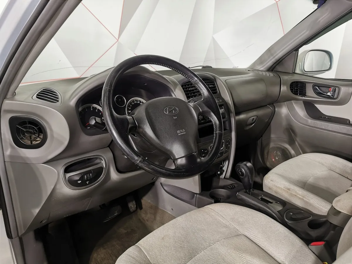 Hyundai Santa Fe 2.7 AT (173 л.с.) Серебристый в АВИЛОН. Слайд №17