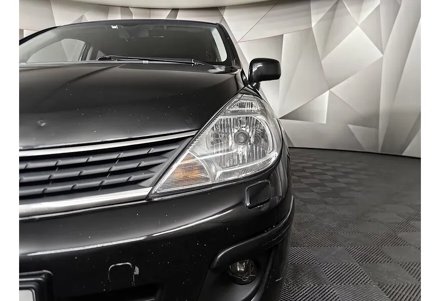 Nissan Tiida 1.6 AT (110 л.с.) Черный в АВИЛОН. Слайд №10