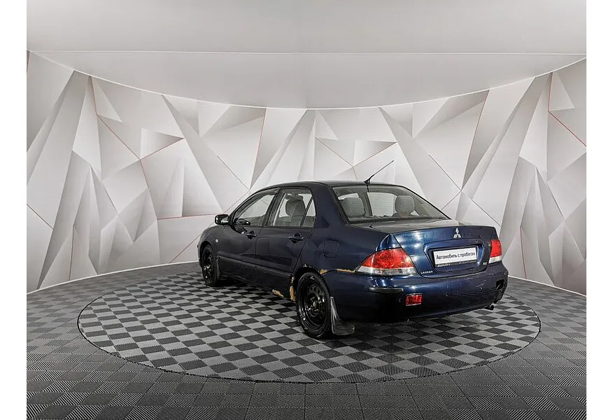 Mitsubishi Lancer 1.6 AT (98 л.с.) Синий в АВИЛОН. Слайд №4
