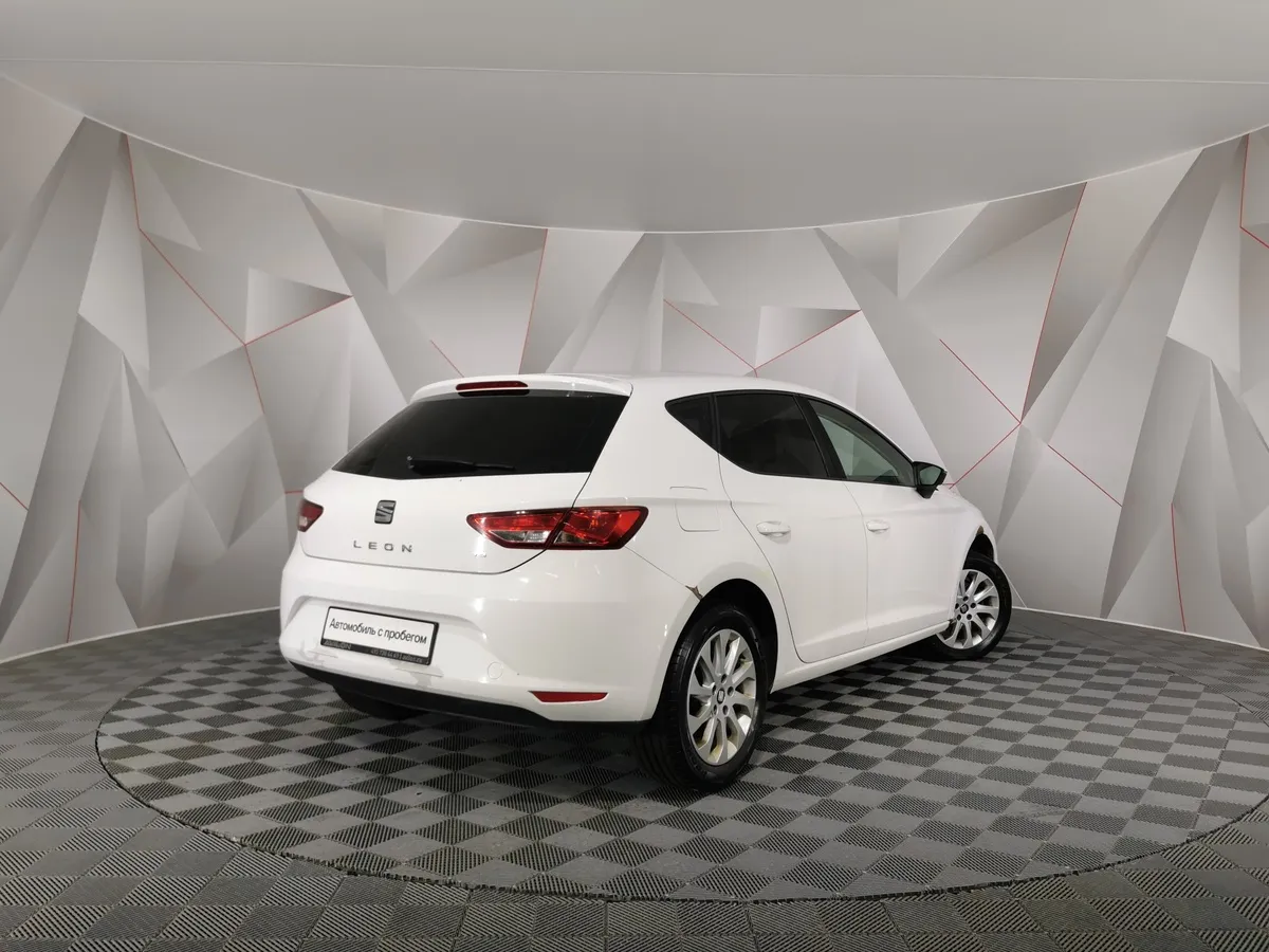 SEAT Leon 1.2 TSI DSG (105 л.с.) Белый в АВИЛОН. Слайд №2