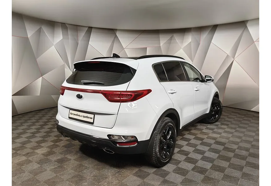 Kia Sportage 2.0 MPI AT AWD (150 л.с.) Premium Белый в АВИЛОН. Слайд №2