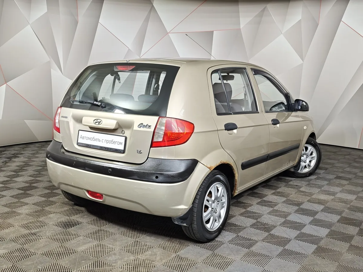 Hyundai Getz 1.6 AT (105 л.с.) Бежевый в АВИЛОН. Слайд №2
