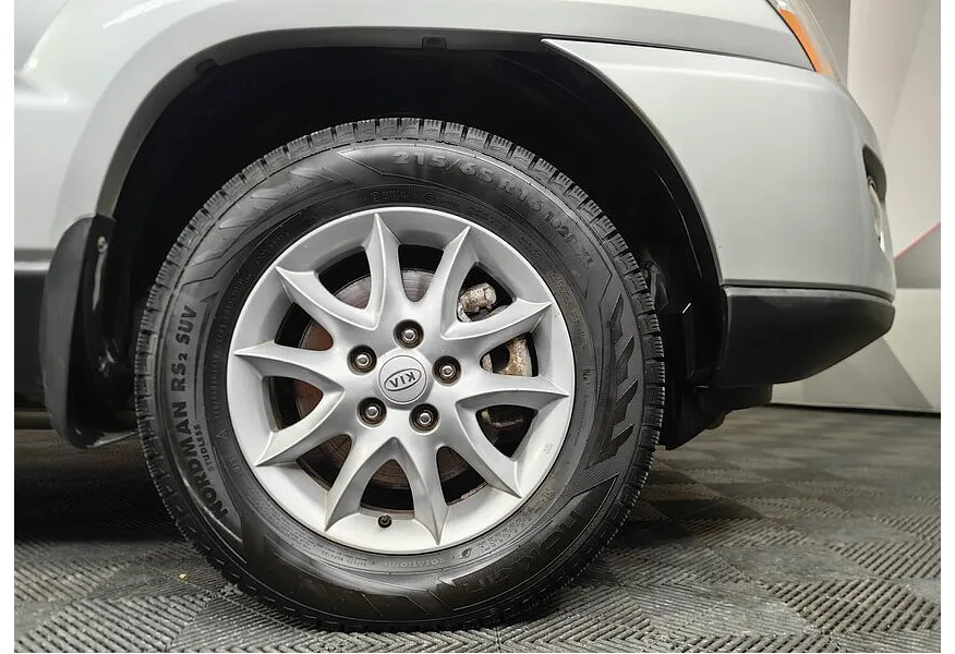 Kia Sportage 2.0 CRDi AT 4WD (112 л.с.) Серебристый в АВИЛОН. Слайд №9