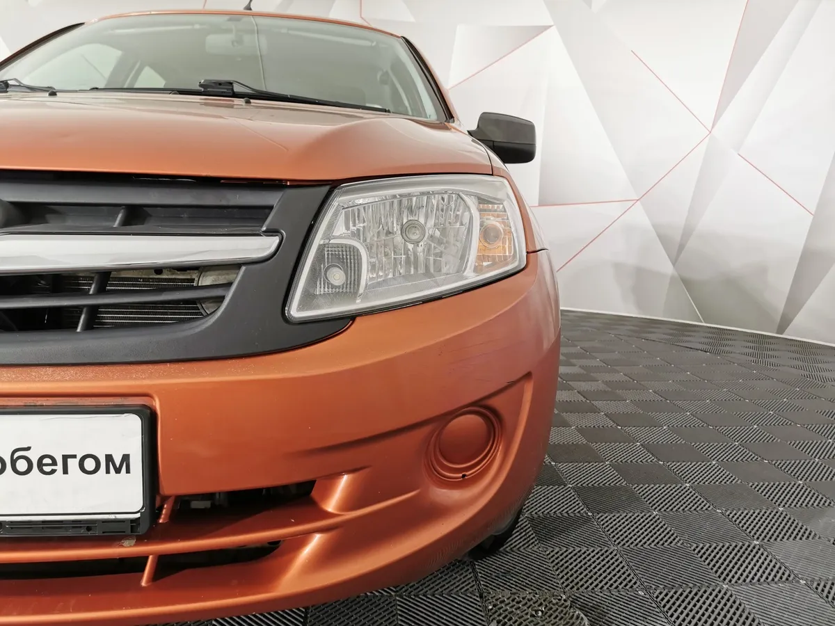 ВАЗ (Lada) Granta 1.6 AT 16кл (98 л.с.) Оранжевый в АВИЛОН. Слайд №10