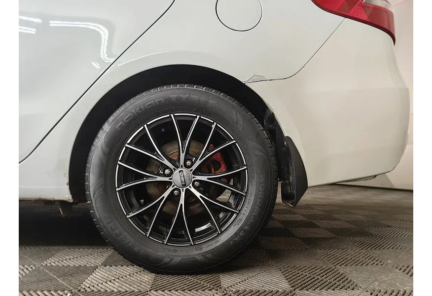 Kia Rio 1.4 MT (107 л.с.) Белый в АВИЛОН. Слайд №9