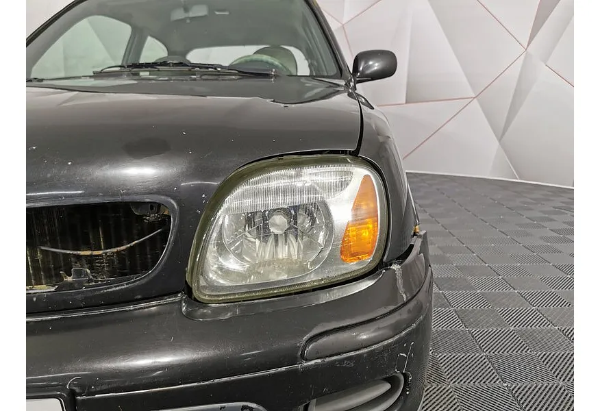 Nissan Micra 1.0 MT (60 л.с.) Черный в АВИЛОН. Слайд №10