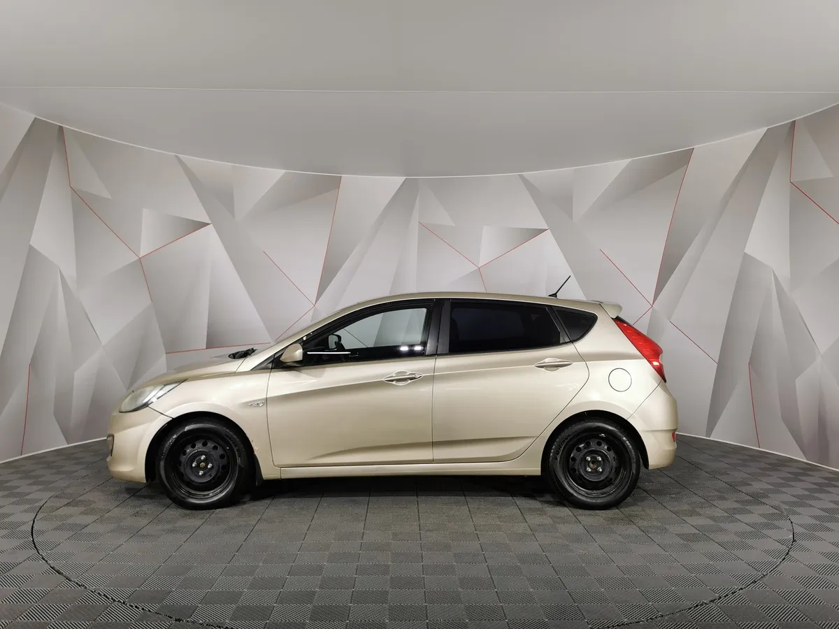 Hyundai Solaris 1.4 AT (107 л.с.) Active Бежевый в АВИЛОН. Слайд №5