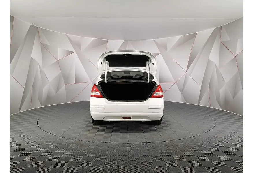 Nissan Tiida 1.6 AT (110 л.с.) Белый в АВИЛОН. Слайд №11