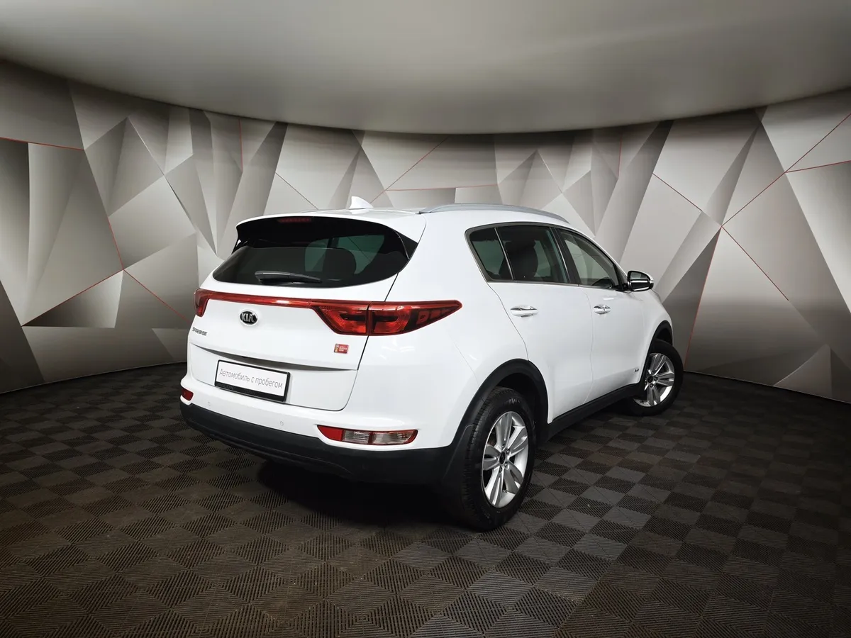 Kia Sportage 2.0 AT 4WD (150 л.с.) Prestige Белый в АВИЛОН. Слайд №2