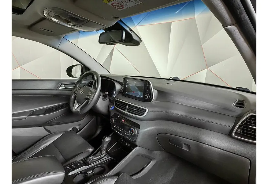 Hyundai Tucson 2.0 CRDi AT 4WD (185 л.с.) High-Tech Коричневый в АВИЛОН. Слайд №12