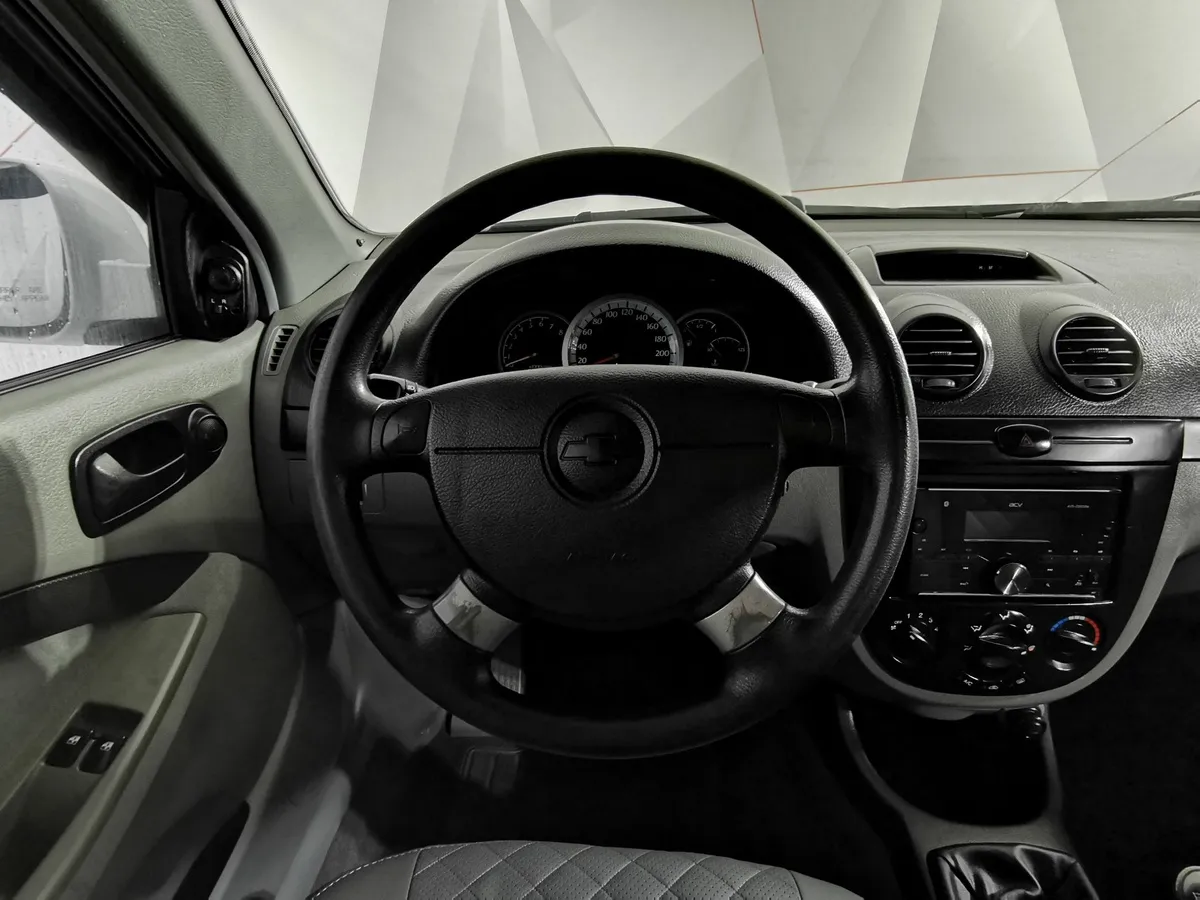 Chevrolet Lacetti 1.6 MT (109 л.с.) Белый в АВИЛОН. Слайд №19