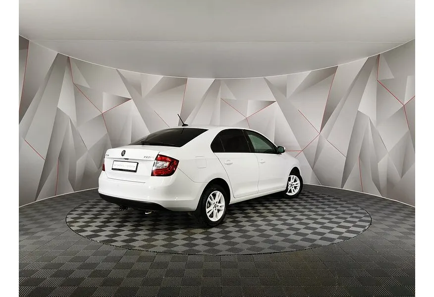 Skoda Rapid 1.6 MT (90 л.с.) Белый в АВИЛОН. Слайд №2