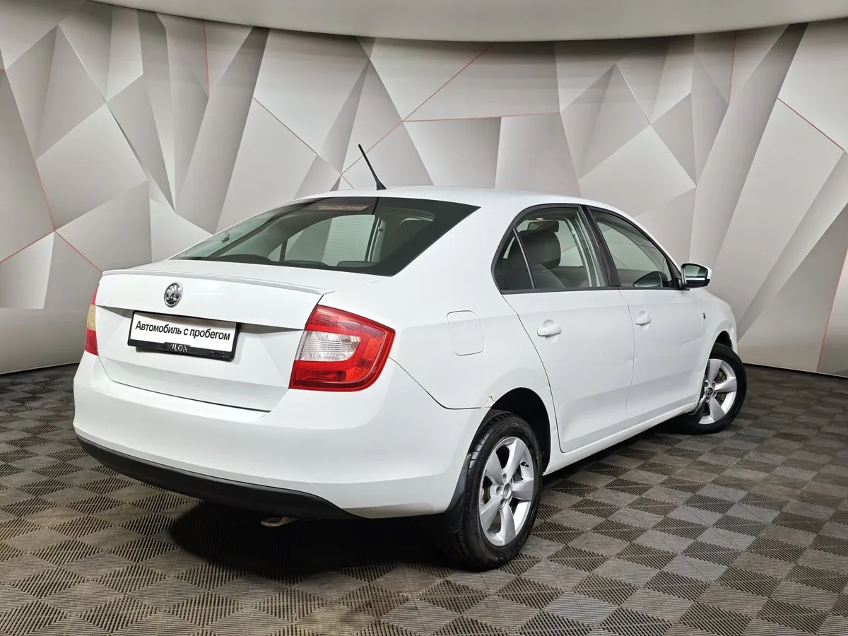 Skoda Rapid 1.4 TSI DSG (122 л.с.) Белый в АВИЛОН. Слайд №2