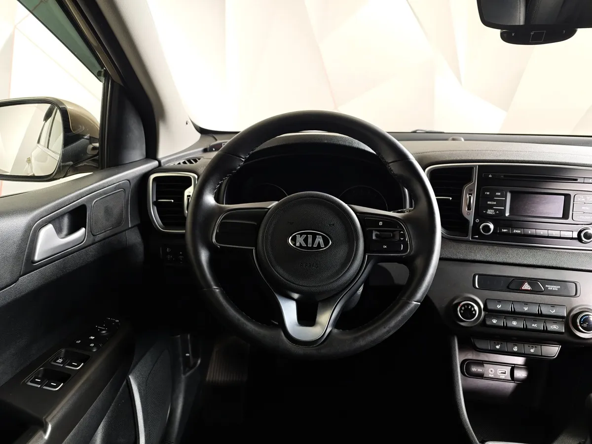 Kia Sportage 2.0 MT (150 л.с.) Classic Коричневый в АВИЛОН. Слайд №19
