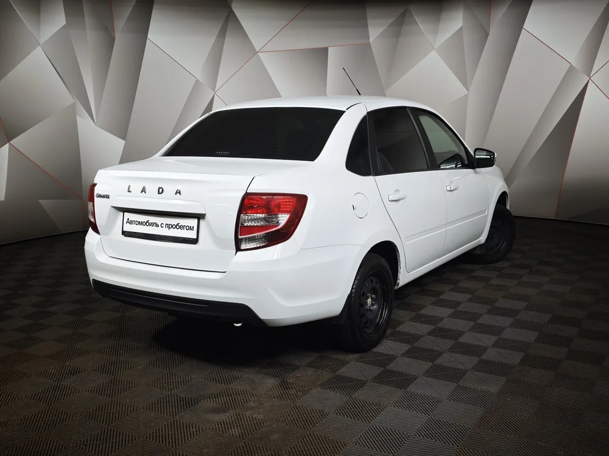 ВАЗ (Lada) Granta 1.6 MT 8кл (87 л.с.) Белый в АВИЛОН. Слайд №2