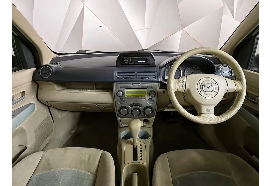 Mazda Demio 1.5 AT (113 л.с.) Серый в АВИЛОН. Слайд №13