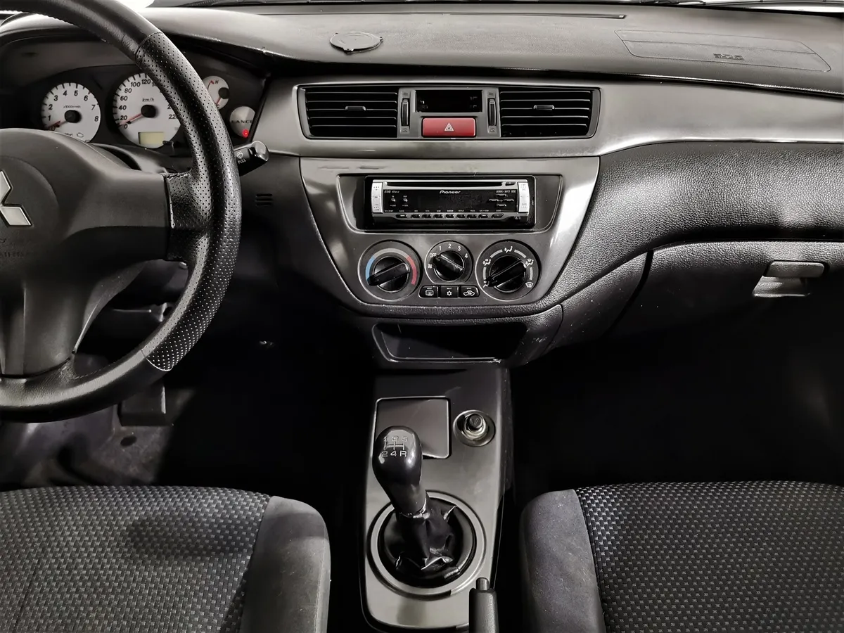 Mitsubishi Lancer 1.6 MT (100 л.с.) Синий в АВИЛОН. Слайд №13