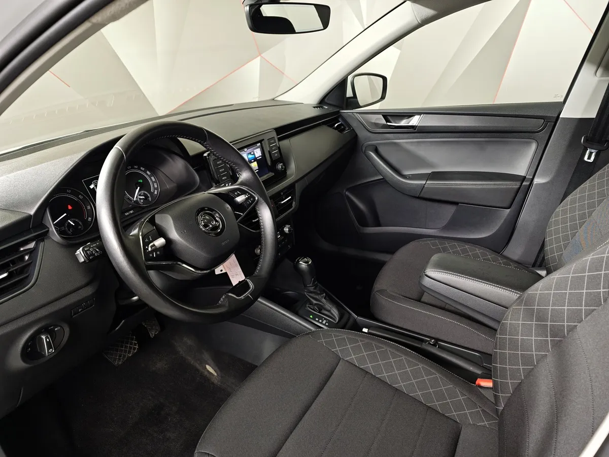 Skoda Rapid 1.6 AT (110 л.с.) Белый в АВИЛОН. Слайд №19