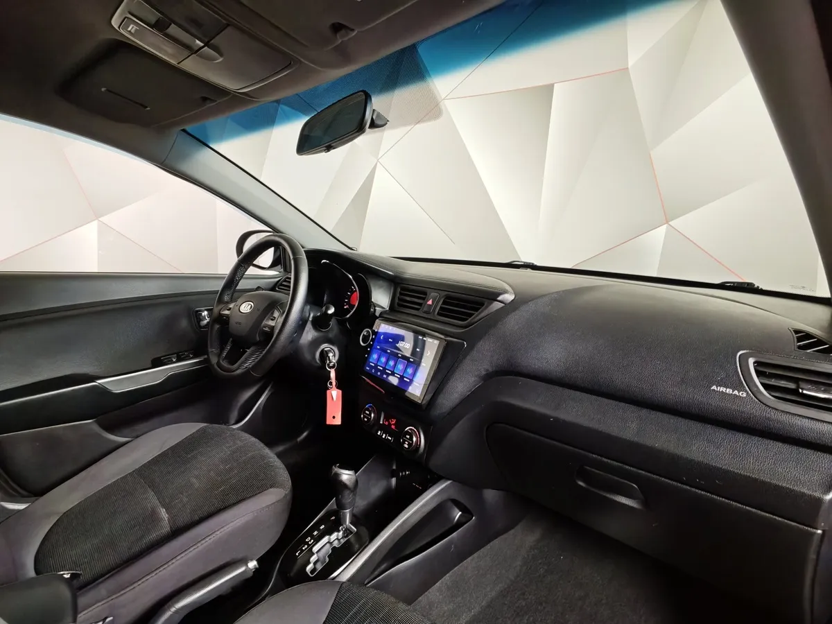 Kia Rio 1.6 AT (123 л.с.) Серый в АВИЛОН. Слайд №10