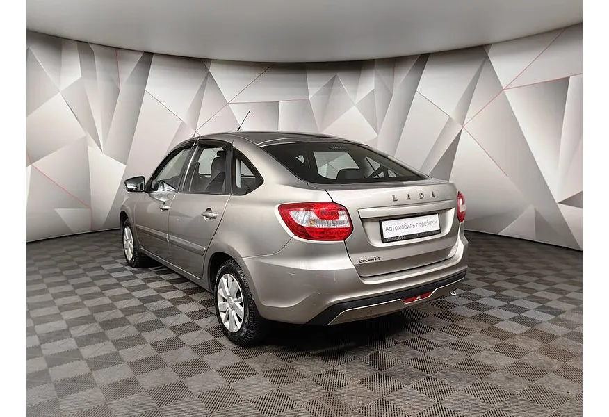 ВАЗ (Lada) Granta 1.6 MT 8кл (82 л.с.) Серый в АВИЛОН. Слайд №4