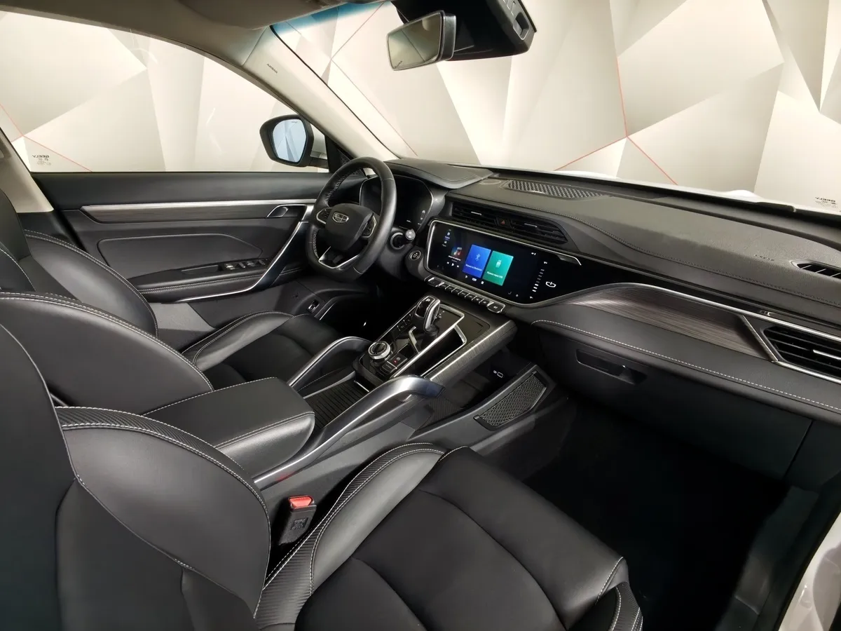 Geely Atlas Pro 1.5T 7DCT AWD (177 л.с.) Flagship Белый в АВИЛОН. Слайд №13