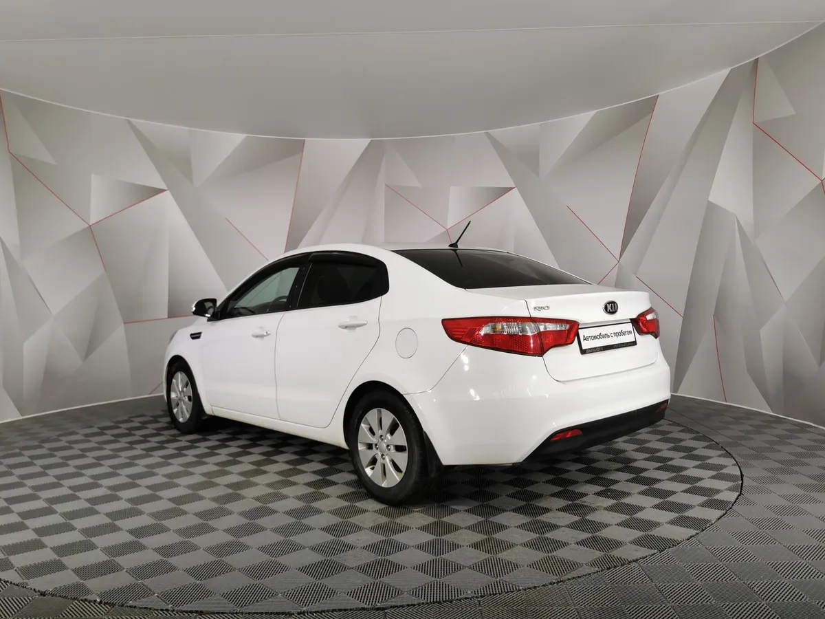 Kia Rio 1.6 AT (123 л.с.) Белый в АВИЛОН. Слайд №4