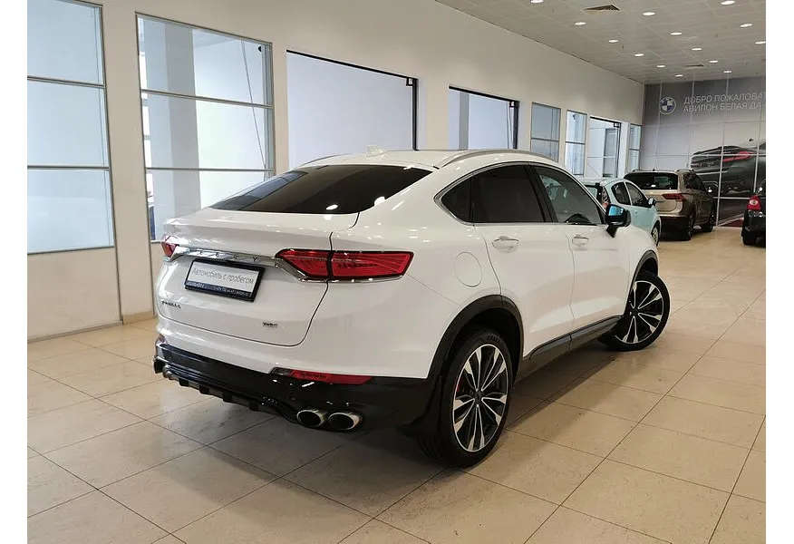 Geely Tugella 2.0 AT AWD (238 л.с.) Flagship Белый в АВИЛОН. Слайд №2